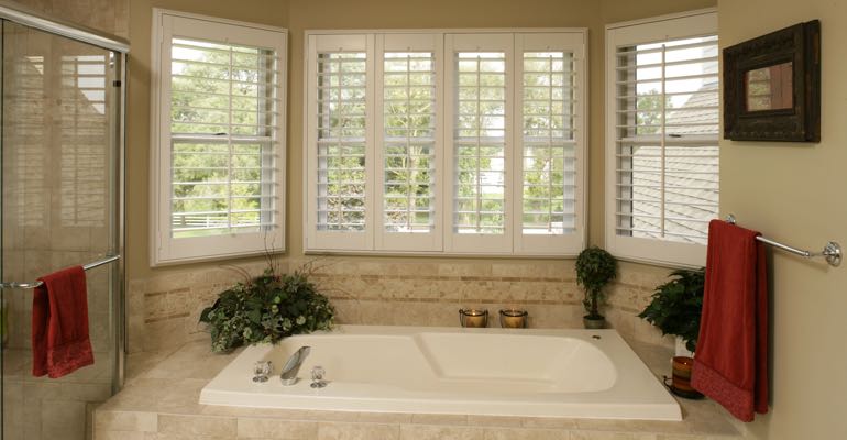 Plantation shutters in Destin bathroom.